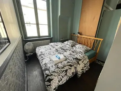 Un ou plusieurs lits dans un hébergement de l'établissement LYON4 cocooning centre Croix Rousse 86m2-4P