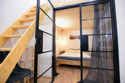 Un ou plusieurs lits dans un hébergement de l'établissement Very cosy and quiet one bedroom flat in Part Dieu