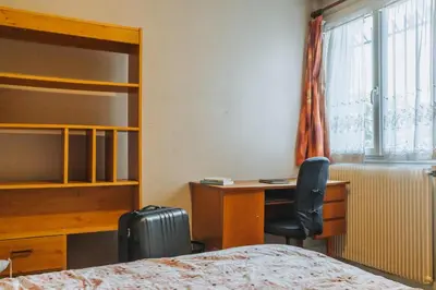 Un ou plusieurs lits dans un hébergement de l'établissement Appartement Paisible à Lyon - 2 Belles Chambres Privées
