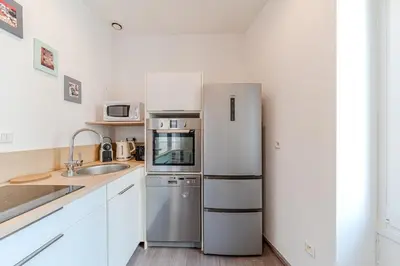 Cuisine ou kitchenette dans l'établissement Le St Antoine cosy 4 pers Lafayette Part Dieu