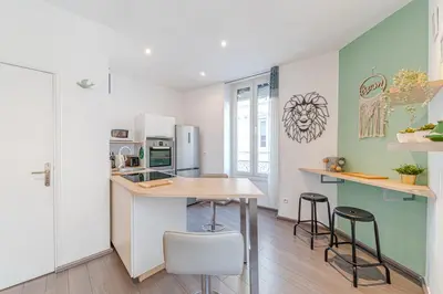 Cuisine ou kitchenette dans l'établissement Le St Antoine cosy 4 pers Lafayette Part Dieu