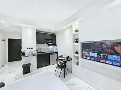 Cuisine ou kitchenette dans l'établissement Cosy Appartement, Part Dieu André Philipe
