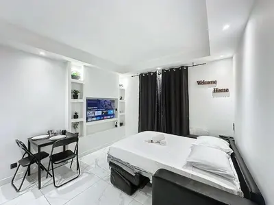 Un ou plusieurs lits dans un hébergement de l'établissement Cosy Appartement, Part Dieu André Philipe