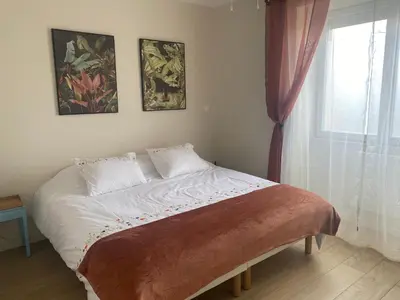 Un ou plusieurs lits dans un hébergement de l'établissement Appartement T2 spacieux et équipé