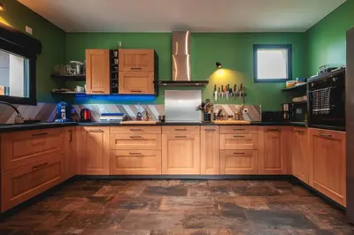 Cuisine ou kitchenette dans l'établissement Le Clos des Lanternes - 14 personnes