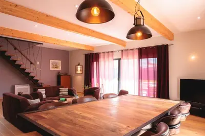 Coin salon dans l'établissement Le Clos des Lanternes - 14 personnes