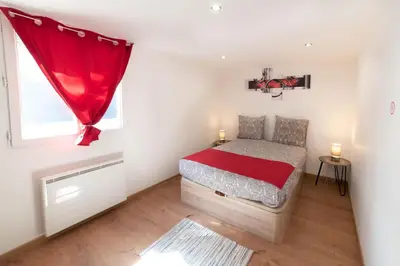 Un ou plusieurs lits dans un hébergement de l'établissement Appartement Gardhenn Stadium LCLD Arena Groupama Lyon