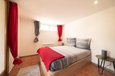 Un ou plusieurs lits dans un hébergement de l'établissement Appartement Gardhenn Stadium LCLD Arena Groupama Lyon