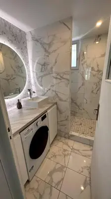Salle de bains dans l'établissement Appartement 3 chambres + parking à Lyon 7