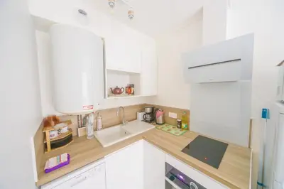 Cuisine ou kitchenette dans l'établissement Appartement en rez-de-chaussée avec jardin