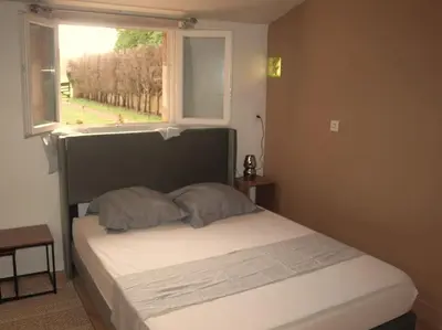 Un ou plusieurs lits dans un hébergement de l'établissement Studio Indépendant en Rez de jardin sans vis-à-vis