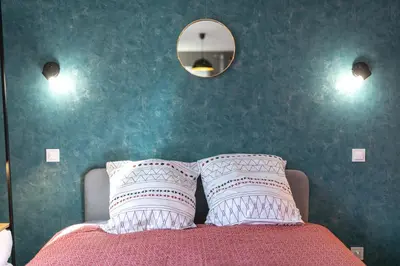 Un ou plusieurs lits dans un hébergement de l'établissement KASA LOUNGE - Climatisation - Au calme