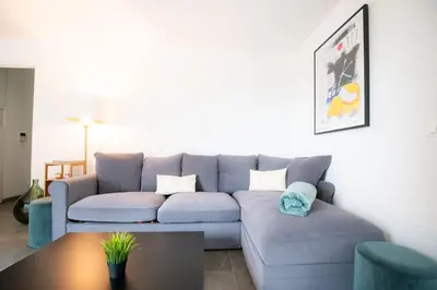 Coin salon dans l'établissement Le Cosmo - Premium apartment w/ terrace- Part Dieu