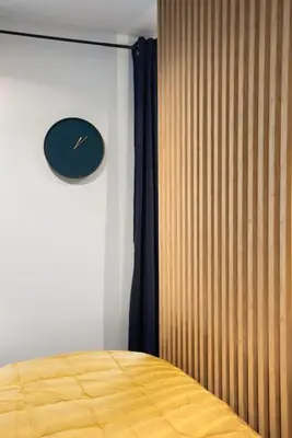 Un ou plusieurs lits dans un hébergement de l'établissement Studio cosy avec parking