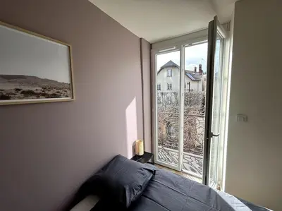 Un ou plusieurs lits dans un hébergement de l'établissement Appartement lumineux en centre-ville / Proche Gare