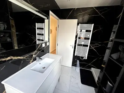 Salle de bains dans l'établissement Appartement lumineux en centre-ville / Proche Gare