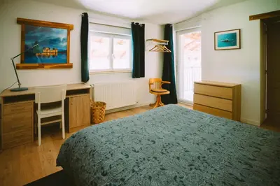 Un ou plusieurs lits dans un hébergement de l'établissement Le clos du chêne - Chambres dans maison Bressane à Saint Trivier sur Moignans