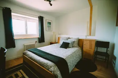Un ou plusieurs lits dans un hébergement de l'établissement Le clos du chêne - Chambres dans maison Bressane à Saint Trivier sur Moignans