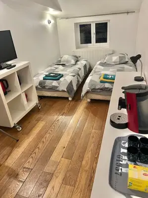 Un ou plusieurs lits dans un hébergement de l'établissement Studio Louis Pradel