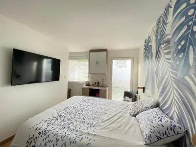 Un ou plusieurs lits dans un hébergement de l'établissement Villa 6 chambres avec piscine et vue exceptionnelle