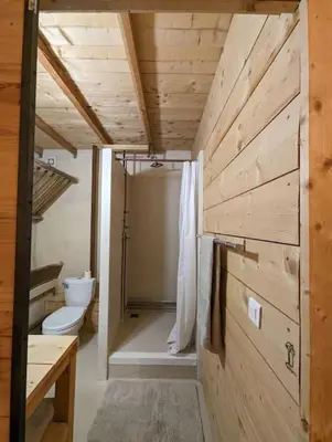 Un ou plusieurs lits dans un hébergement de l'établissement Logement - Studio indépendant à Pérouges