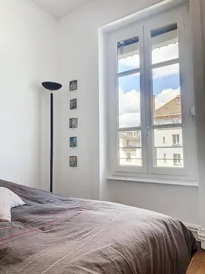 Un ou plusieurs lits dans un hébergement de l'établissement Spacieux T3 80m2 plein centre presque ile !