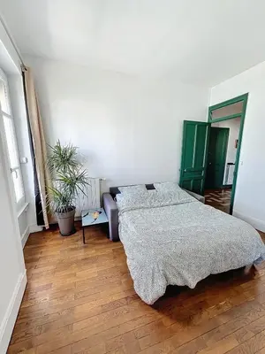 Un ou plusieurs lits dans un hébergement de l'établissement Spacieux T3 80m2 plein centre presque ile !