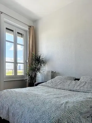 Un ou plusieurs lits dans un hébergement de l'établissement Spacieux T3 80m2 plein centre presque ile !