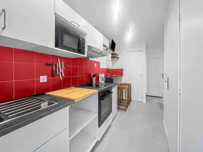 Cuisine ou kitchenette dans l'établissement Le Petit Torcieu