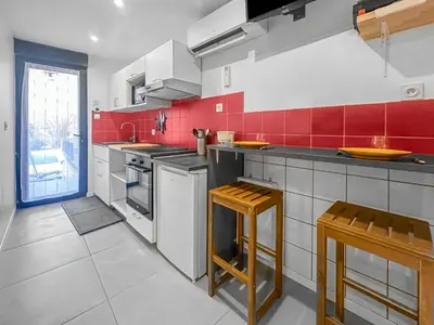 Cuisine ou kitchenette dans l'établissement Le Petit Torcieu