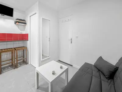 Coin salon dans l'établissement Le Petit Torcieu