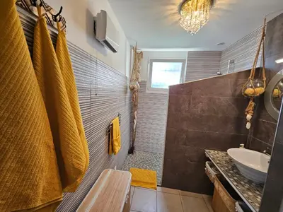 Salle de bains dans l'établissement Le duo