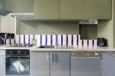Cuisine ou kitchenette dans l'établissement Charmant et Caractère proche Tête d'Or