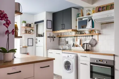 Cuisine ou kitchenette dans l'établissement Charming two-bedroom duplex Saxe Gambetta