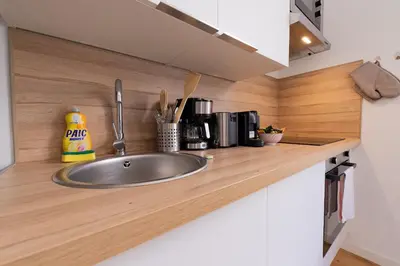 Cuisine ou kitchenette dans l'établissement Le Palais Boursier - Cordeliers