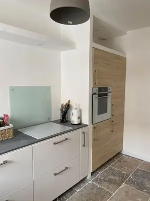 Cuisine ou kitchenette dans l'établissement Charmant appartement-20 min Lyon-proche Aéroport-Eurexpo