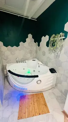Salle de bains dans l'établissement Détente, Spa et Parking privé
