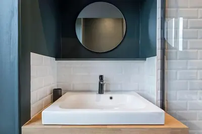 Salle de bains dans l'établissement 10' de Lyon- Appartement Tassin Centre - 2 Parking