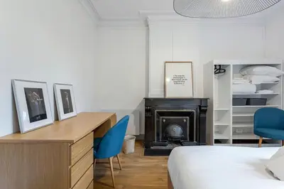 Un ou plusieurs lits dans un hébergement de l'établissement 10' de Lyon- Appartement Tassin Centre - 2 Parking