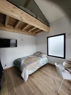 Un ou plusieurs lits dans un hébergement de l'établissement THE BEDROOM - proche aeroport Lyon, groupama stadium, ldlc arena, eurexpo, viaRhôna