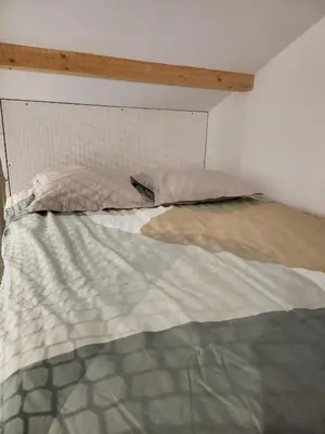 Un ou plusieurs lits dans un hébergement de l'établissement THE BEDROOM - proche aeroport Lyon, groupama stadium, ldlc arena, eurexpo, viaRhôna