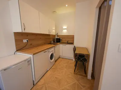 Cuisine ou kitchenette dans l'établissement Gîte de la Roche