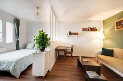 Un ou plusieurs lits dans un hébergement de l'établissement Appartement proche du Parc de la Tête d'Or - Garage Gratuit