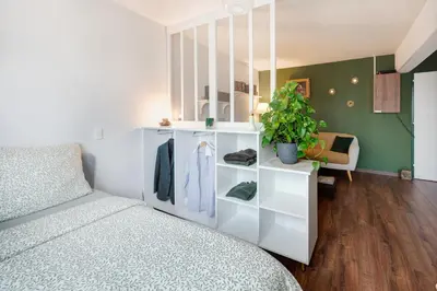 Un ou plusieurs lits dans un hébergement de l'établissement Appartement proche du Parc de la Tête d'Or - Garage Gratuit