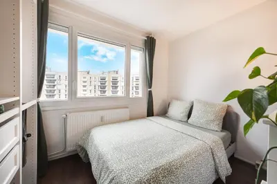 Un ou plusieurs lits dans un hébergement de l'établissement Appartement proche du Parc de la Tête d'Or - Garage Gratuit