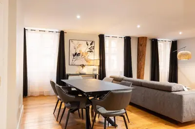 Coin salon dans l'établissement Cœur Presqu'île Appartement spacieux AC