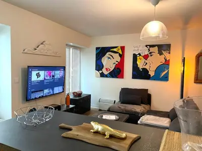 Télévision ou salle de divertissement dans l'établissement 22 COEUR DE VIENNE