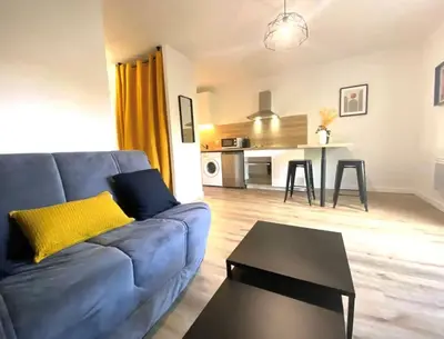 Cuisine ou kitchenette dans l'établissement Appartements avenue général Leclerc