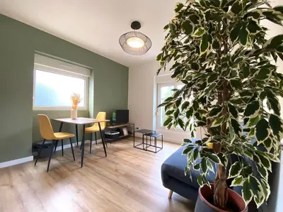 Coin salon dans l'établissement Appartements avenue général Leclerc