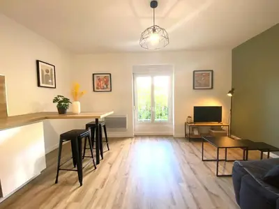 Télévision ou salle de divertissement dans l'établissement Appartements avenue général Leclerc